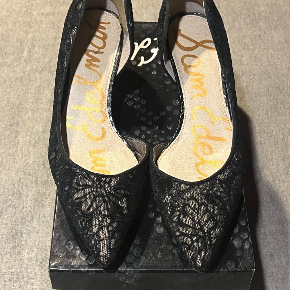 Black lace dress shoes, open side sliver on heel. Gently used.